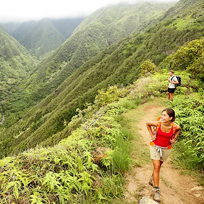 People hiking Waihee Ridge Trail in Maui