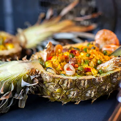 Rice in pineapple with seafood